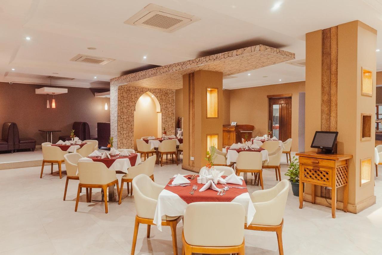 Tanga Beach Resort & Spa Kültér fotó