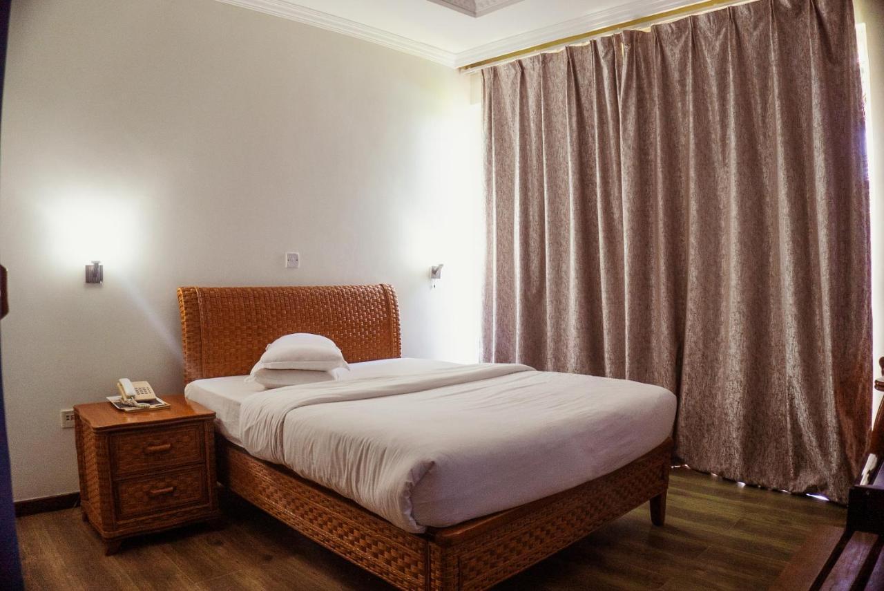 Tanga Beach Resort & Spa Kültér fotó
